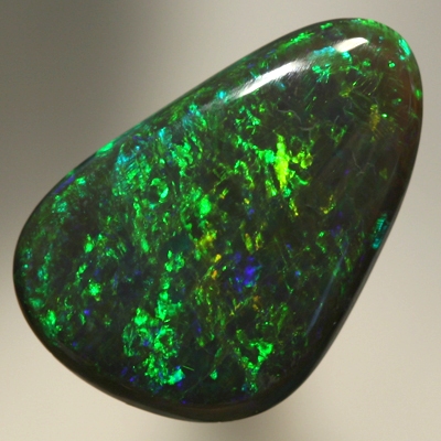 SOLID BLACK OPAL Strong golden fire, top quality.  SEE VIDEO